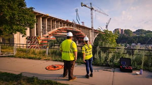 Photo of SEH people looking at bridge