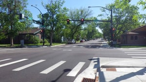 Residential intersection with red stoplight